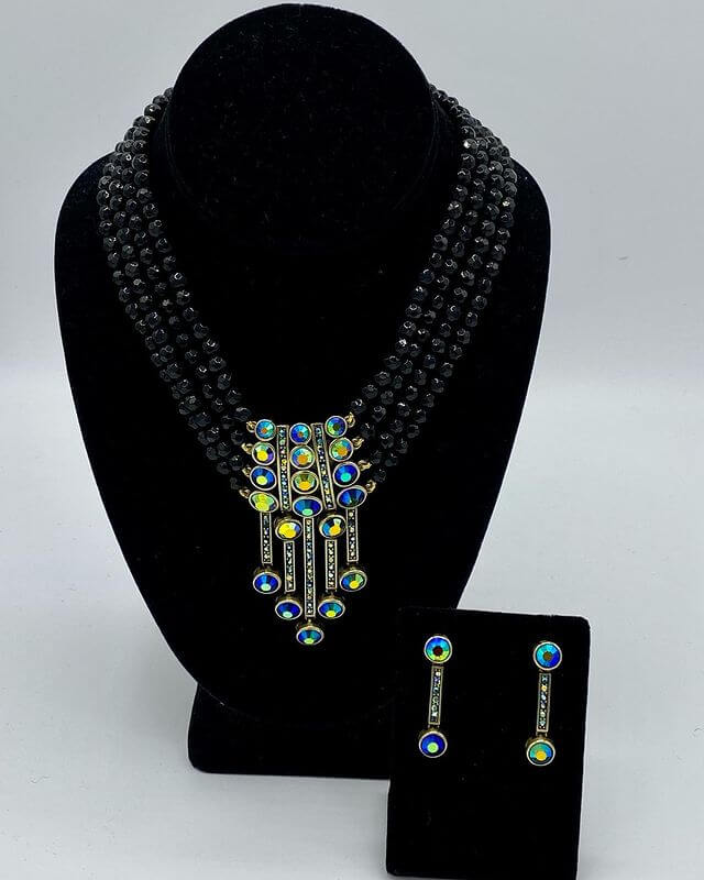 Beautiful necklace and earrings with crystal stones.